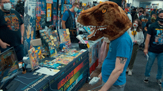 Lizardman playing Pole Calibur at Too Many Games